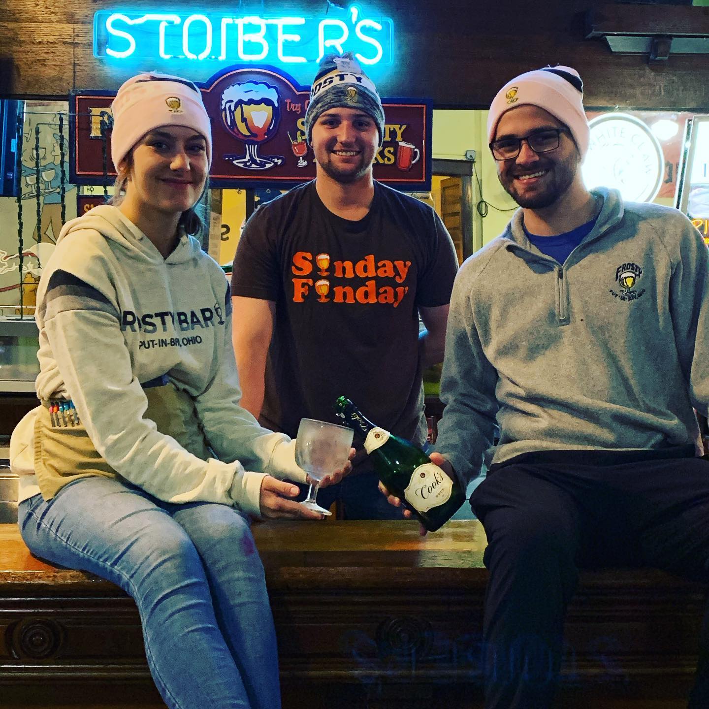 three staff members at frosty bar